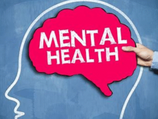 A chalk board with a red sign saying mental health