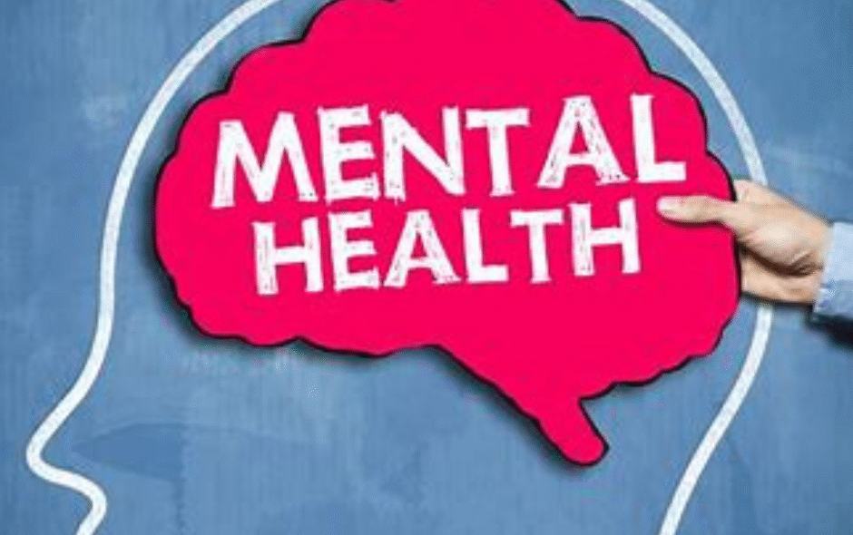 A chalk board with a red sign saying mental health