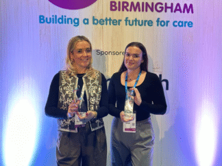Image shows our staff winning awards at the thirty under 30 award show