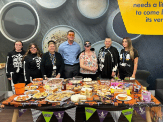Image shows staff members at the halloween fund raiser for Zoe's Place