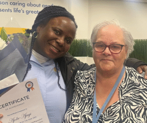 Runner up for carer of the year award collecting flowers