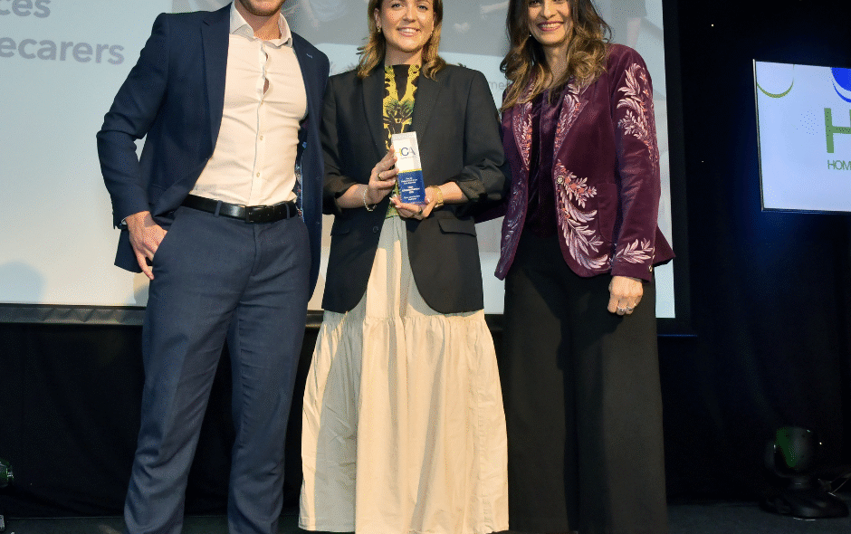 shows staff accepting an award at the HCA Awards