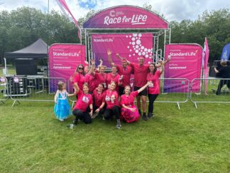 image of MerseyCare Julie Ann staff members taking part in pretty muddy in 2024
