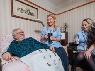 Two carers and a service user